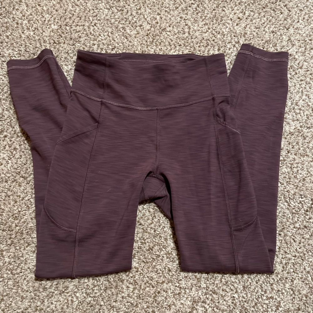 Lululemon leggings with side pockets. Size 4.